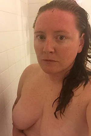 Ginger girlfriend Erin poses with gorgeous tits