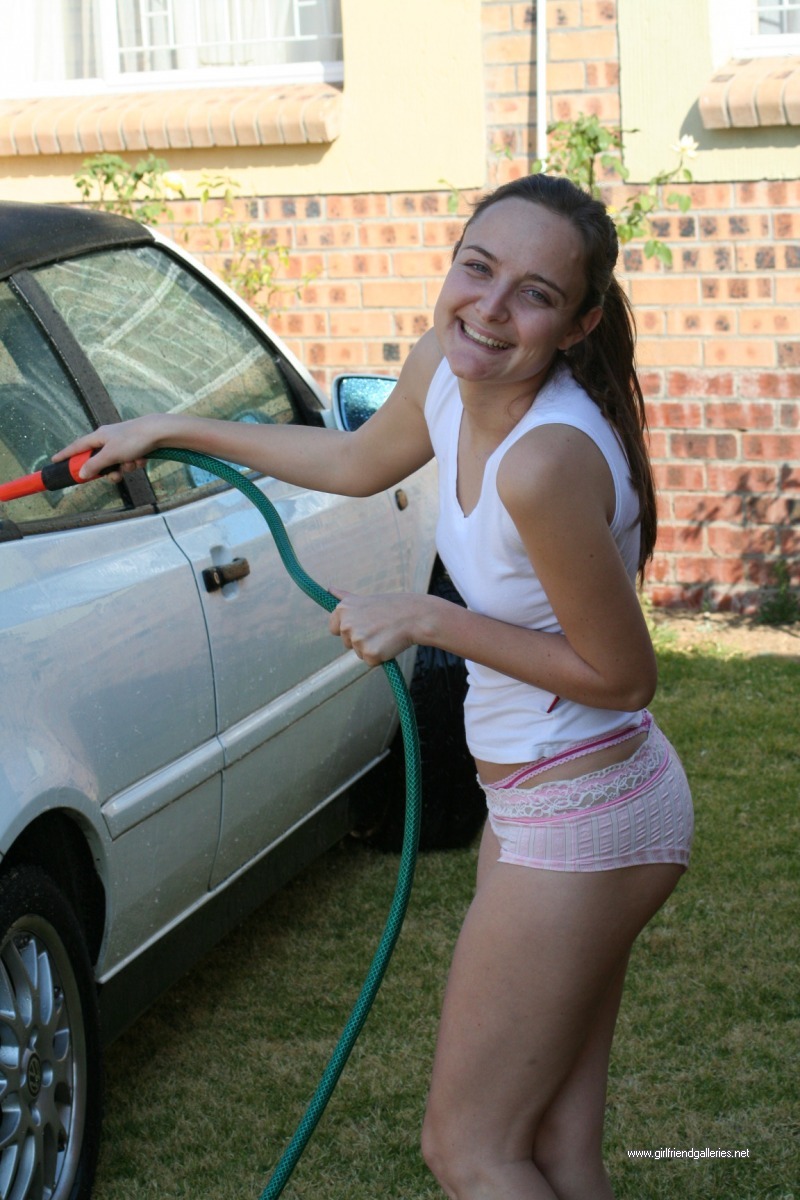 Slutty Davida getting wet and naked washing her car
